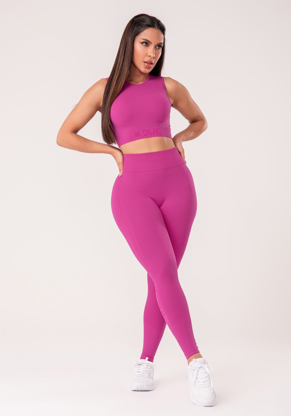 Legging fitness feminina fúcsia com detalhe logomania e modela bumbum seamless+