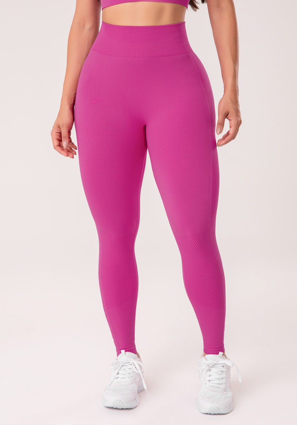 Legging fitness feminina fúcsia com detalhe logomania e modela bumbum seamless+